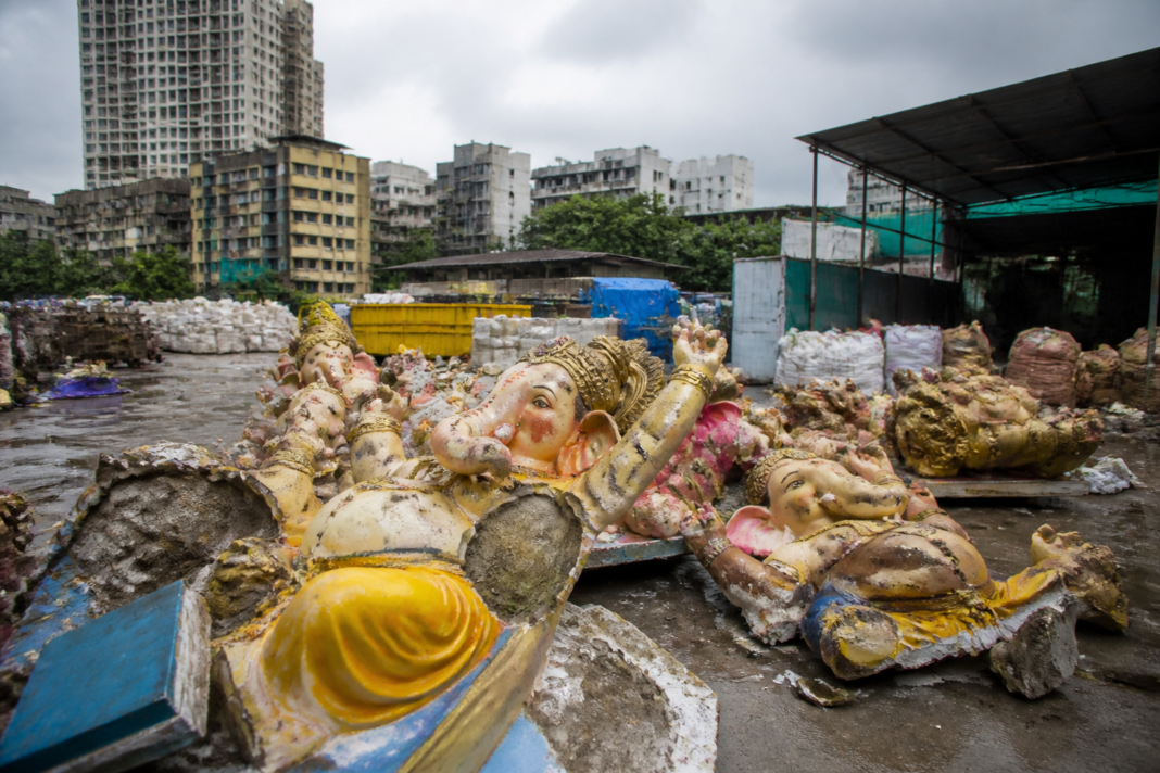 Broken Mulund Ganesh idols stored near a Mumbai dumping area after immersion