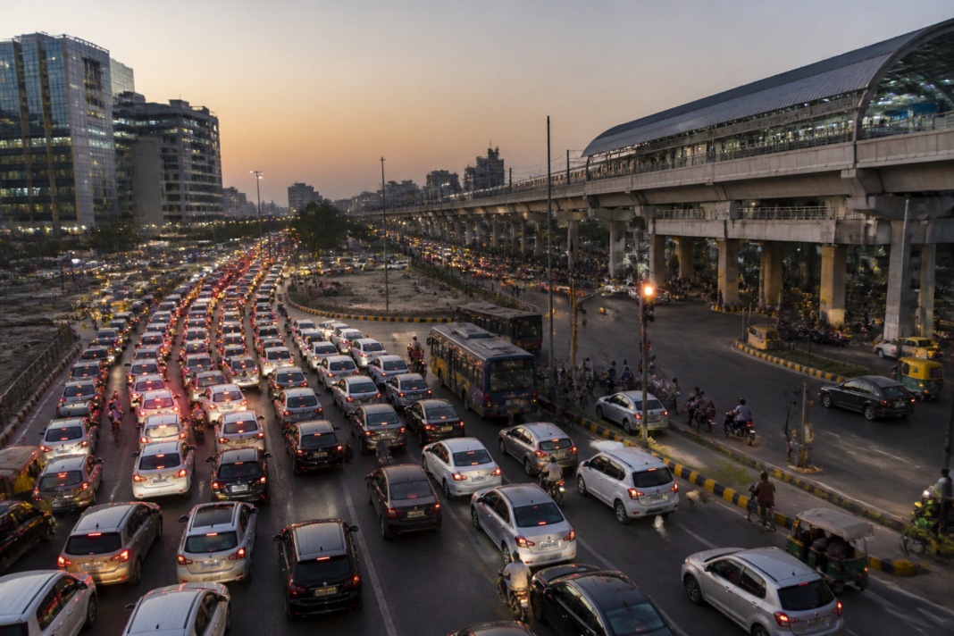 Gurugram flyover and underpass plan at a congested RD City Chowk junction near the metro station.