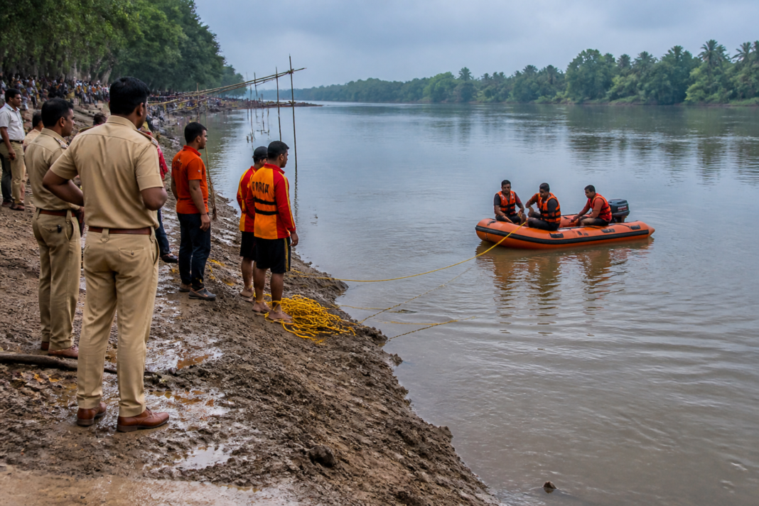 Rescue personnel at the Surya River after a Dahanu Ganesh visarjan accident