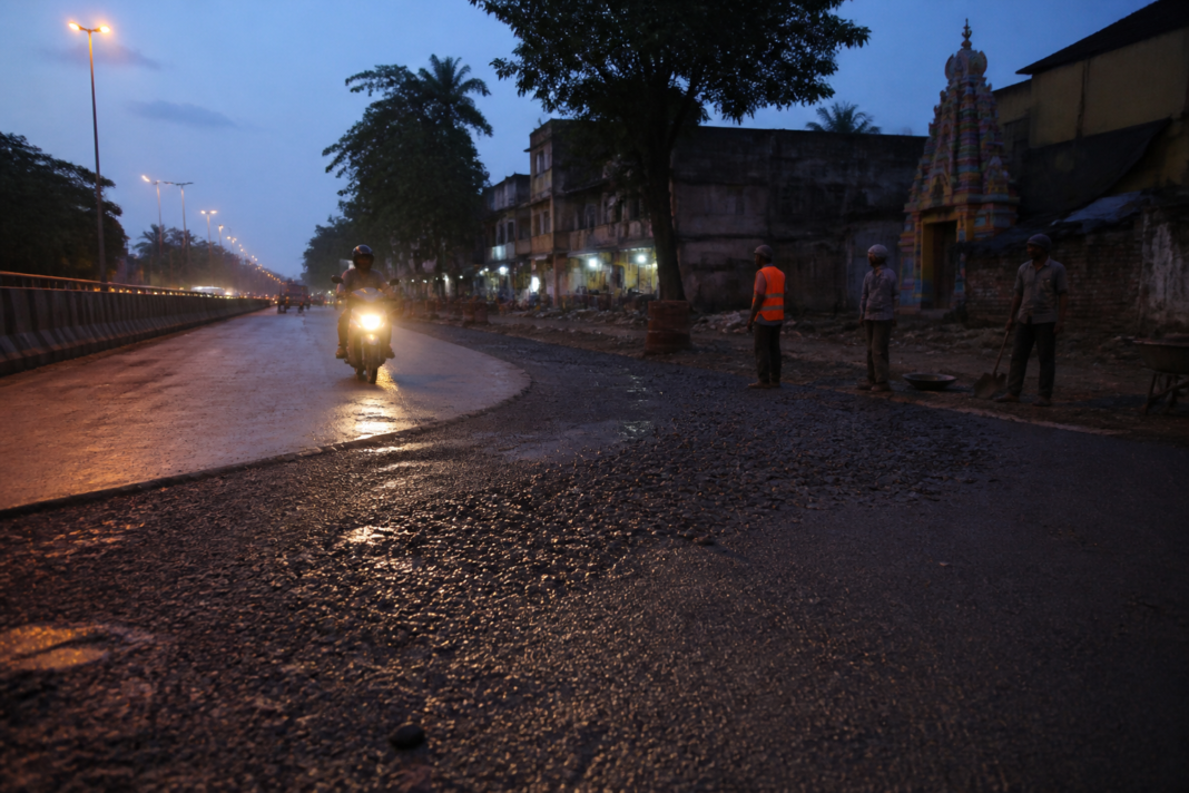Naigaon road accident site with fresh hot mastic and an unfinished road repair area