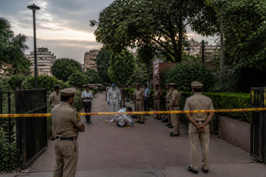 Police personnel outside Astha Kunj Park near Kalkaji Mandir in the Delhi park assault case.