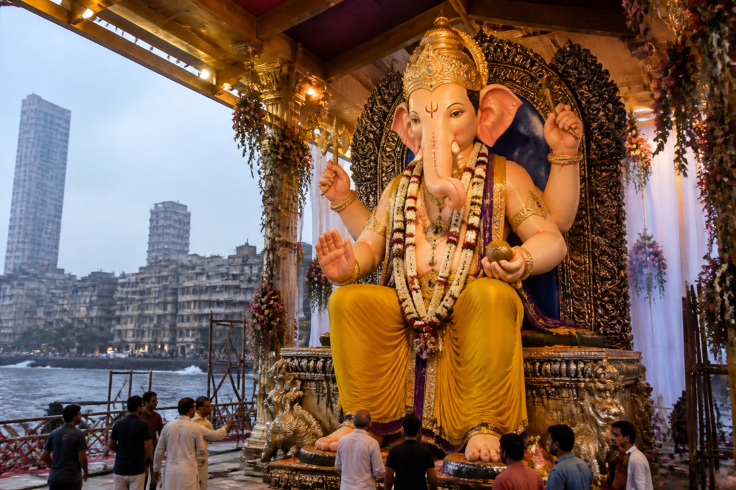 Mumbai fibre Ganpati idol at a Girgaon festival pandal before its planned reuse.
