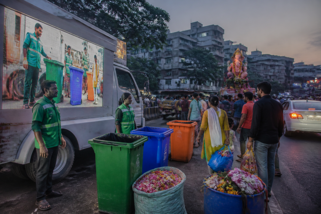 Malkajgiri waste segregation campaign vehicle promoting four-bin collection during Ganesh immersion