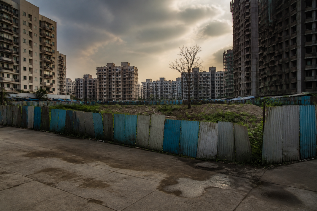 Bhayandar land dispute site near Navghar with urban development and construction activity