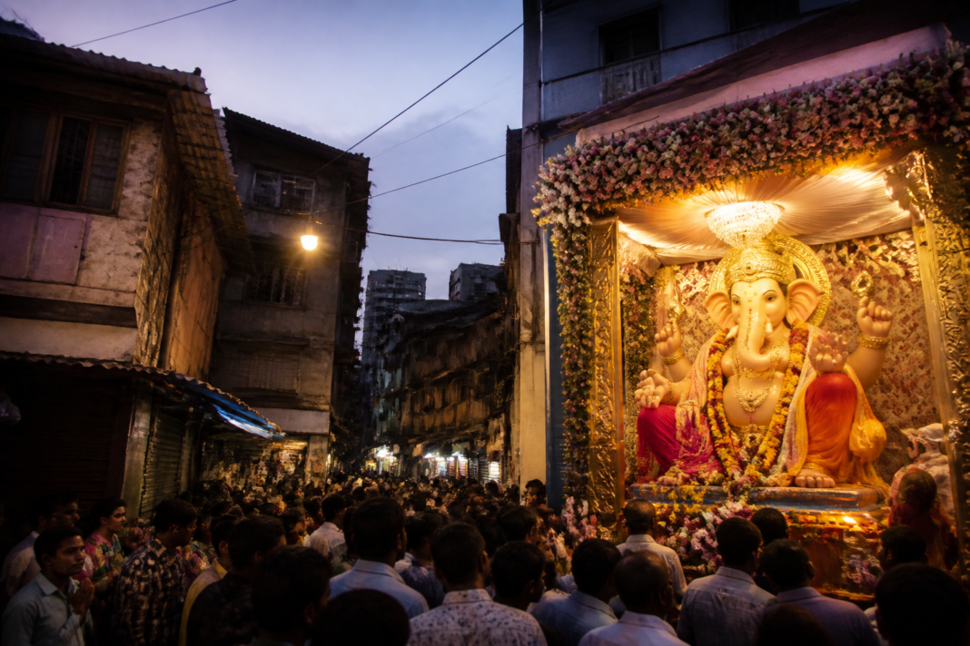 Kamathipura Ganeshotsav mandal and a large Ganesh idol in a South Mumbai lane