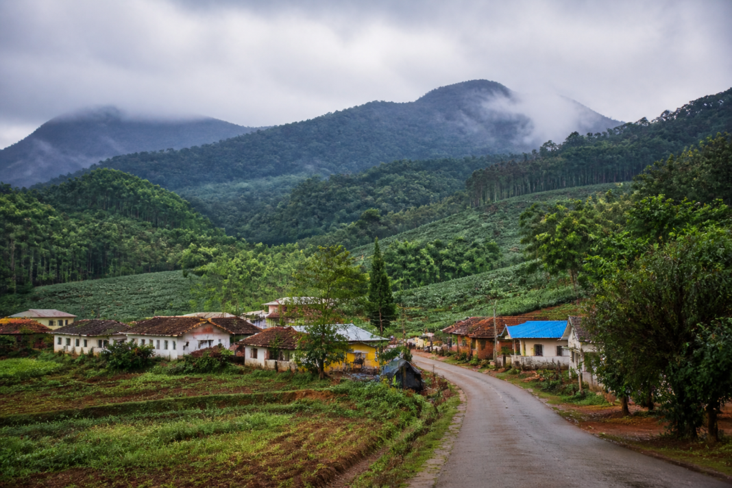Western Ghats ESA landscape with forest, plantations and village homes in Karnataka