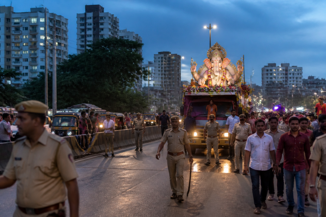 Ganesh immersion procession on a Hyderabad road under court-monitored noise guidelines