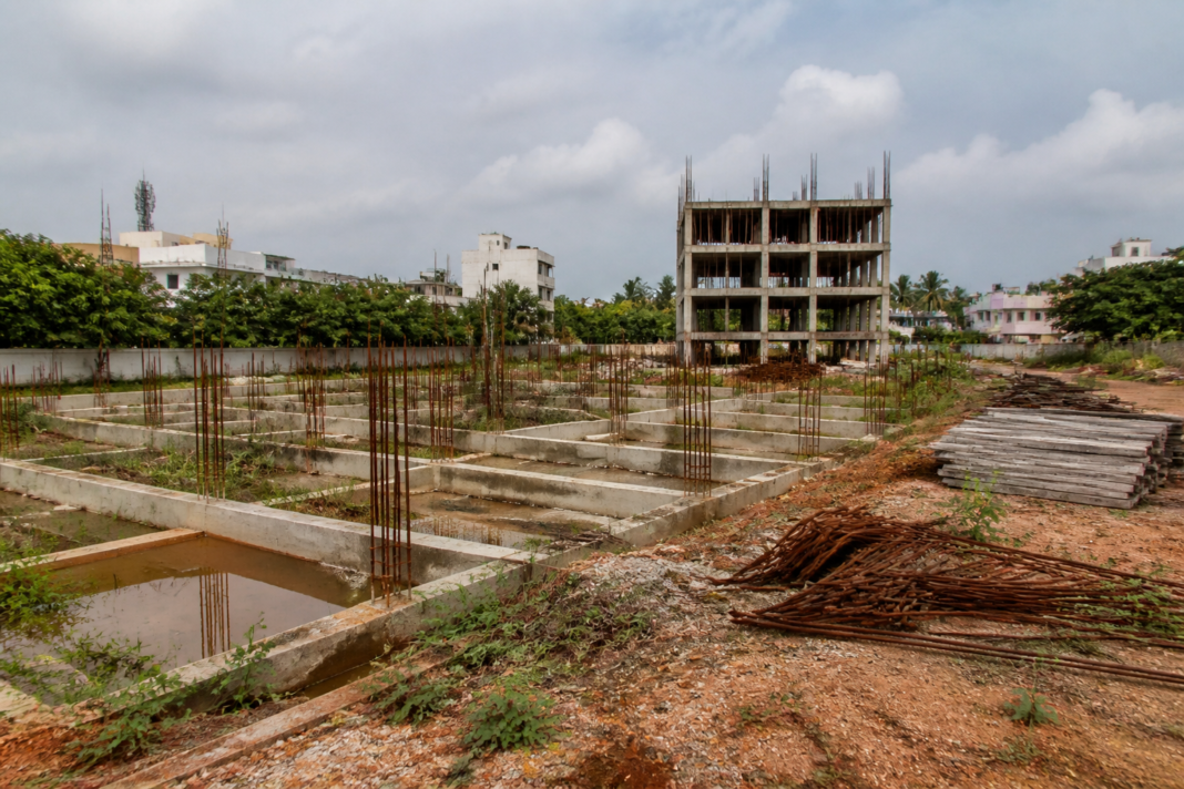 Tamil Nadu mini TIDEL Parks project site with a stalled construction foundation