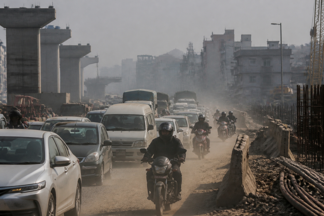 Delhi air pollution over traffic and a dusty road near Zakhira