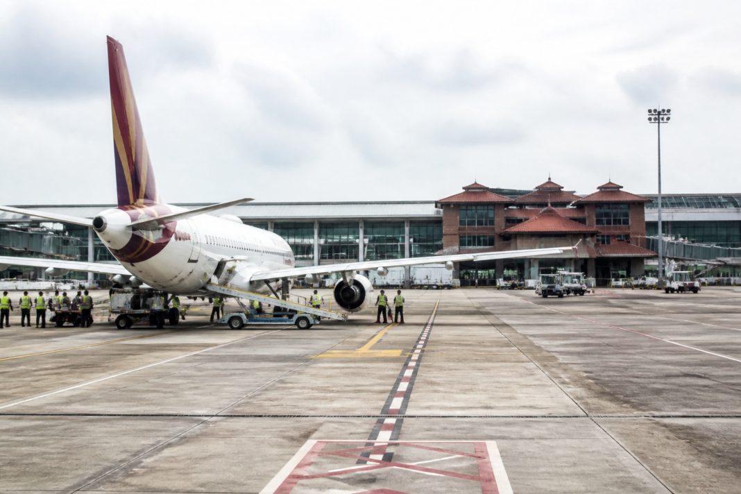 CIAL aviation consultancy team at an Indian airport with aircraft and ground equipment