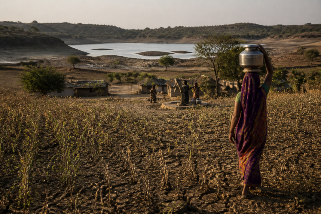 Maharashtra water scarcity affecting dry farmland and a low-storage reservoir in Marathwada