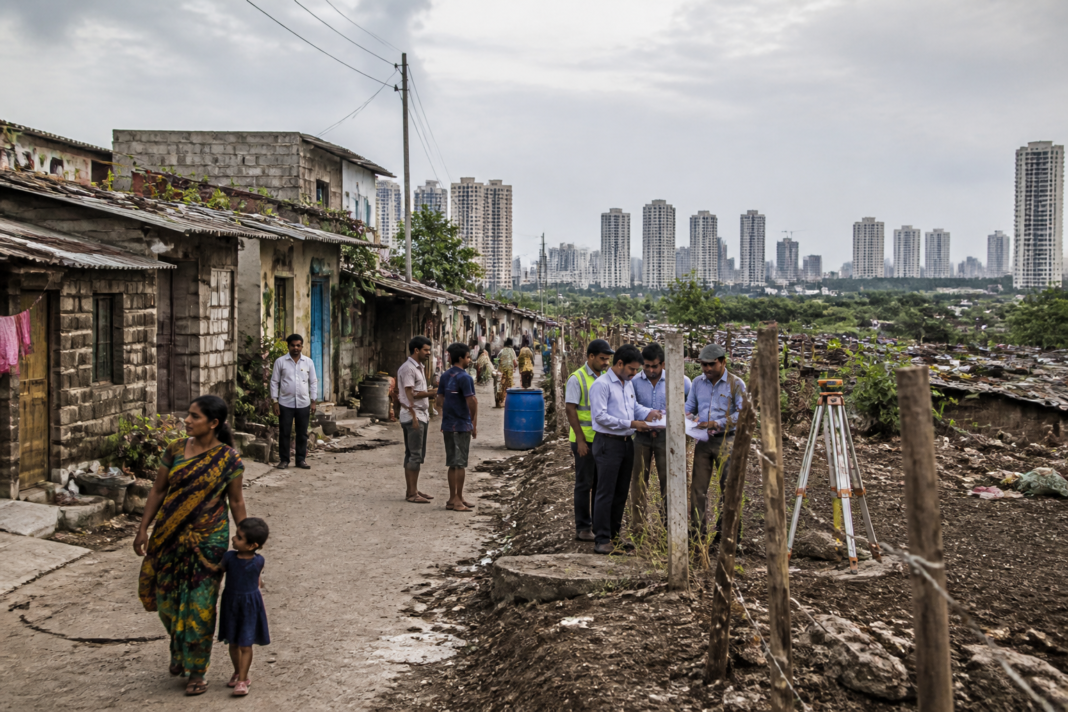 Mumbai Pune encroachment regularisation committee reviewing urban housing and government land policy