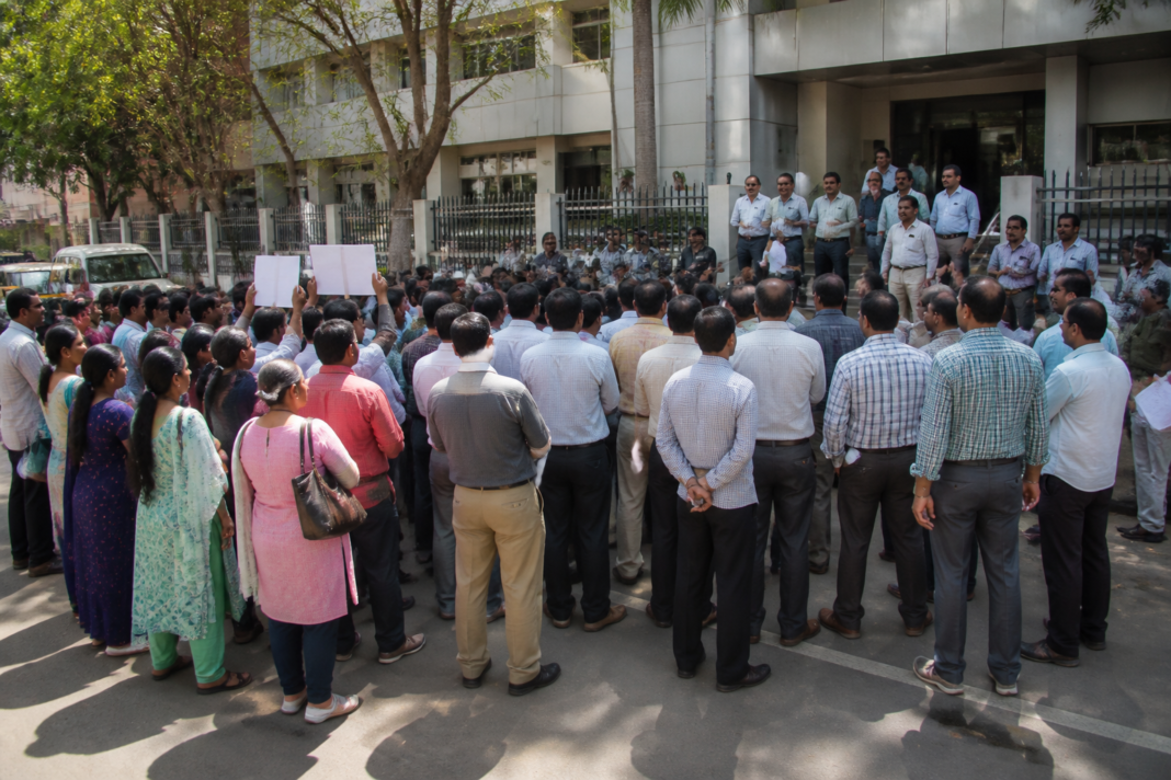 BSNL wage revision protest by employees outside the company office in Mysuru