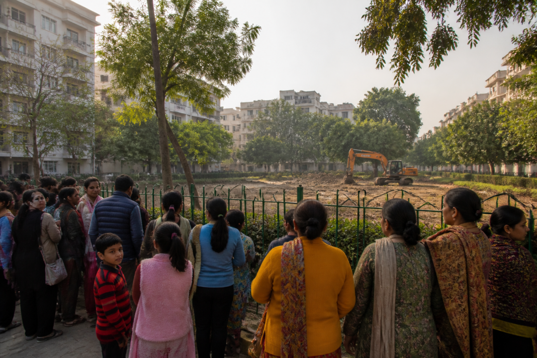 Residents protest the Vasant Kunj park dispute near the proposed shopping complex site.