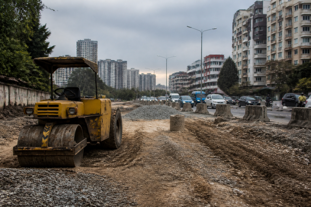 Bengaluru roadwork stalled amid construction material shortages and unfinished street repairs.
