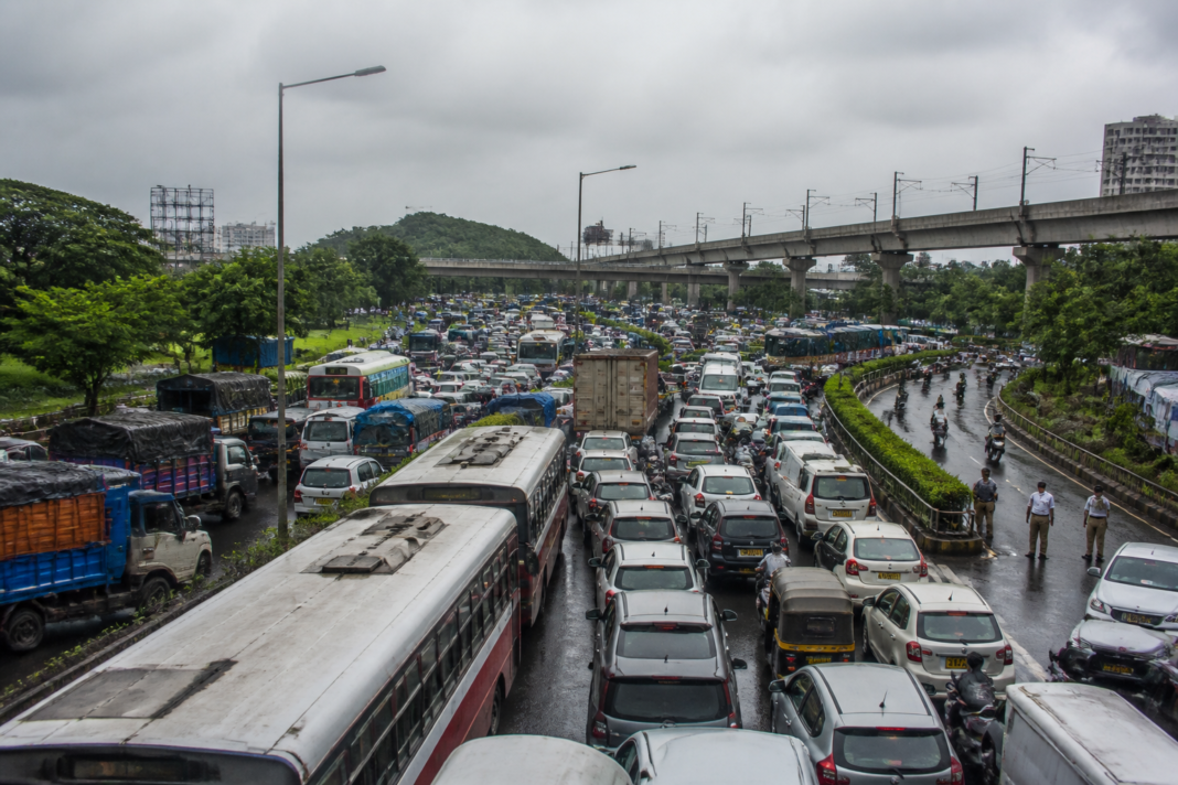 Kalamboli Junction traffic jam with long vehicle queues on a congested Navi Mumbai road