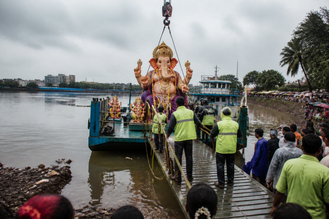 Mira Bhayandar Ganpati immersion operation with idols being moved towards a civic immersion site