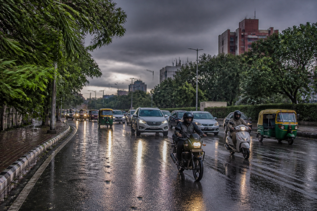 Delhi weather after monsoon withdrawal with rain clouds over the capital