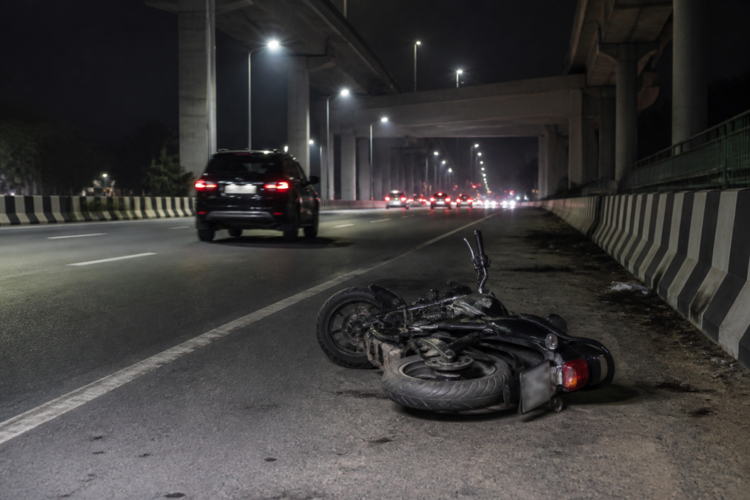 Dwarka Expressway hit-and-run scene with a motorcycle and SUV on a Delhi road