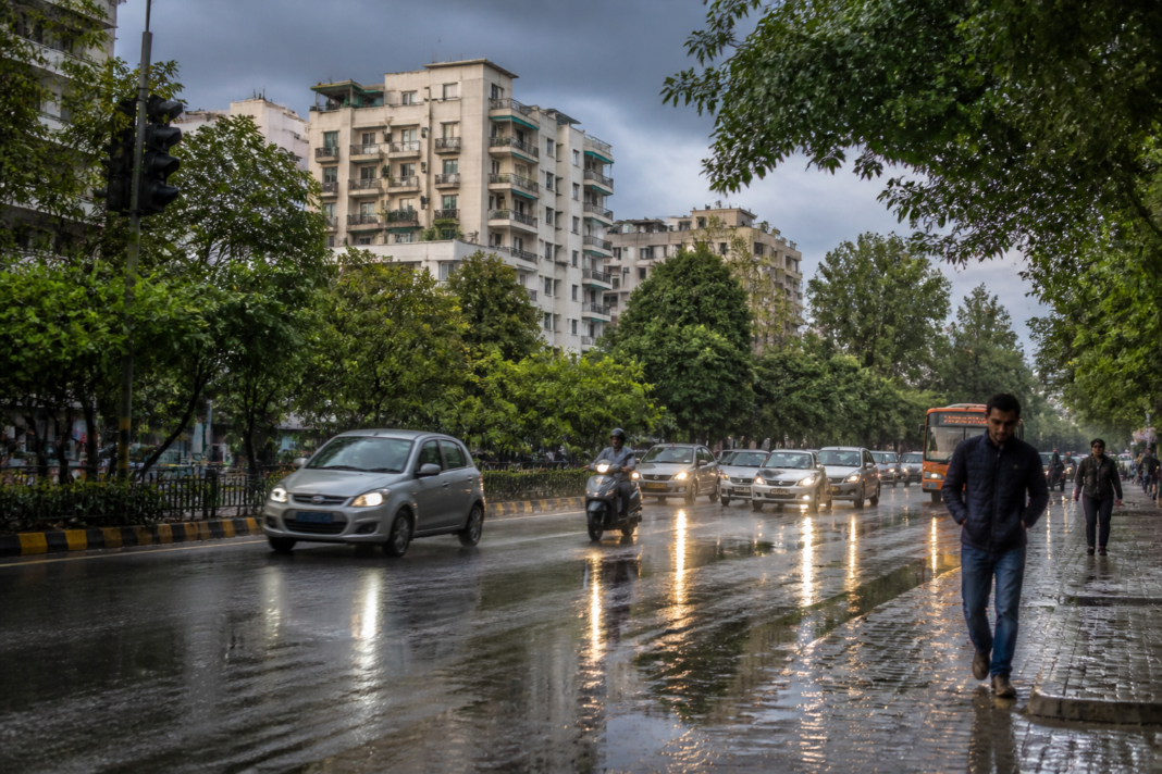 Rain-wet Delhi streets during an unusually cool September morning
