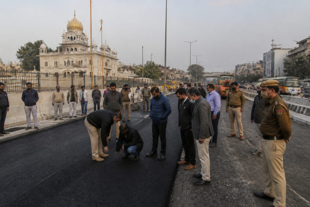 Delhi PWD road dispute site on Ring Road near Tilak Nagar during a road inspection