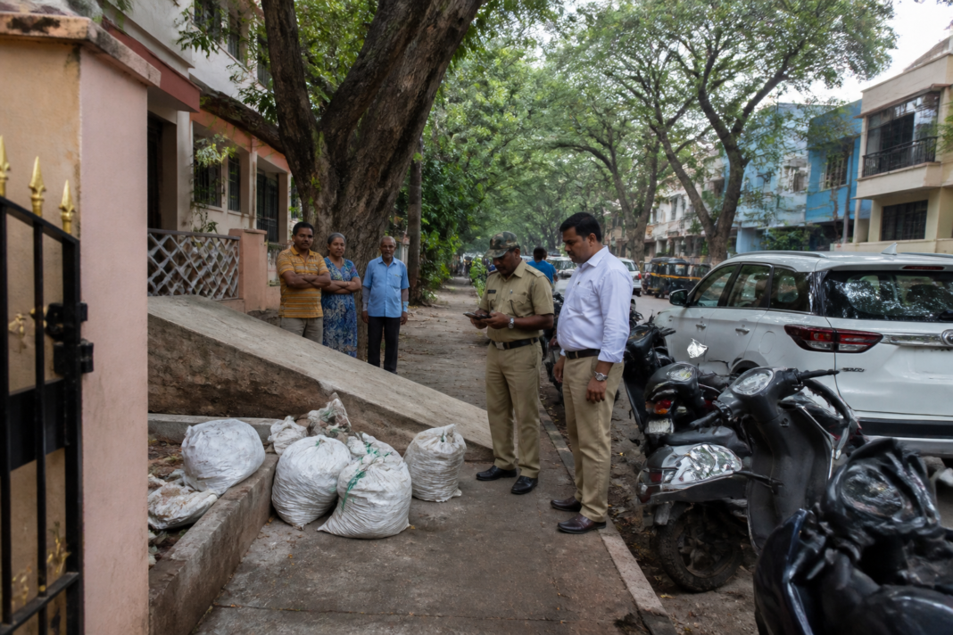 Basavanagudi civic issues reflected by garbage and blocked footpaths on a Bengaluru residential street