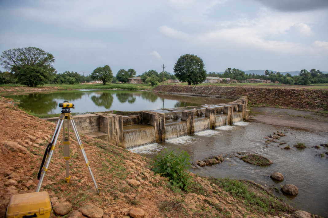 Odisha check dams and a geo-tagged irrigation structure viewed in a rural landscape