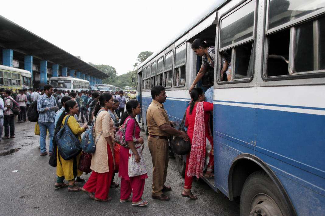 NBSTC free bus travel with women passengers boarding a state transport bus in North Bengal