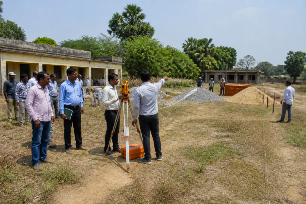 Mirzapur school construction site being measured and marked by local officials in Lahuria Dah village