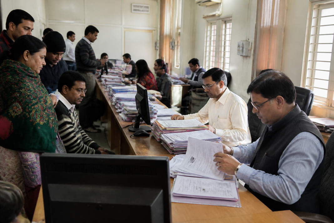 Jharkhand voter roll revision officials processing electoral applications at a district election office