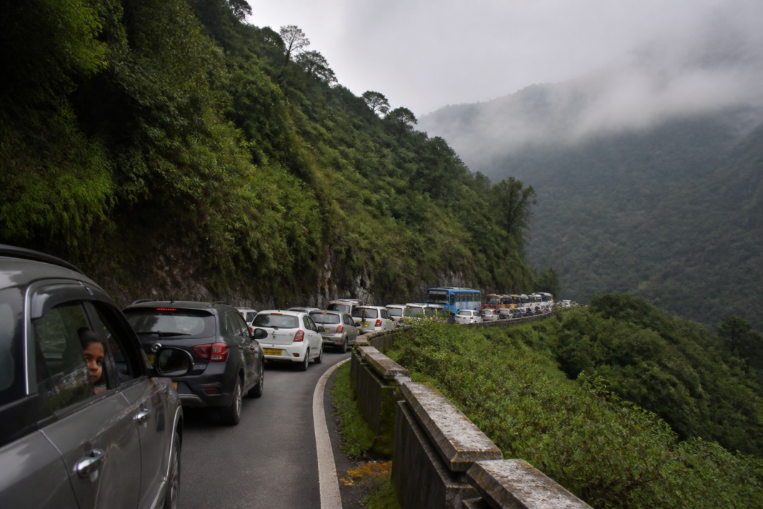 Ooty traffic jam with tourist vehicles on a hill road near the Nilgiris