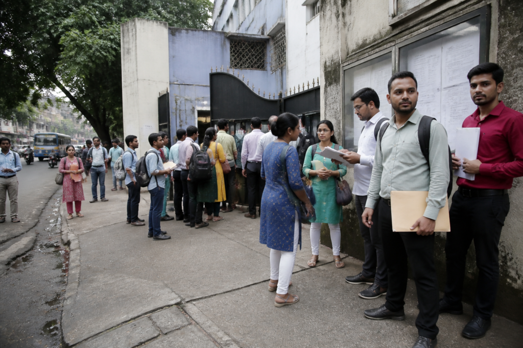 West Bengal SSC teacher recruitment candidates waiting outside a school interview centre