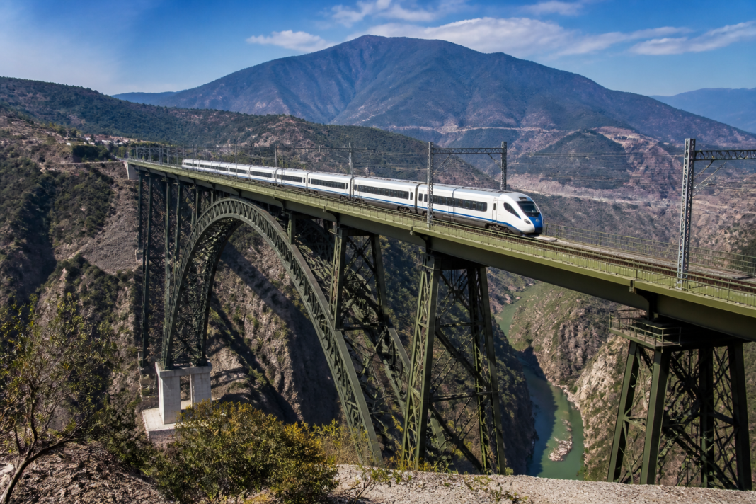 Vande Bharat train crossing the Chenab Bridge on the Katra-Banihal rail section.
