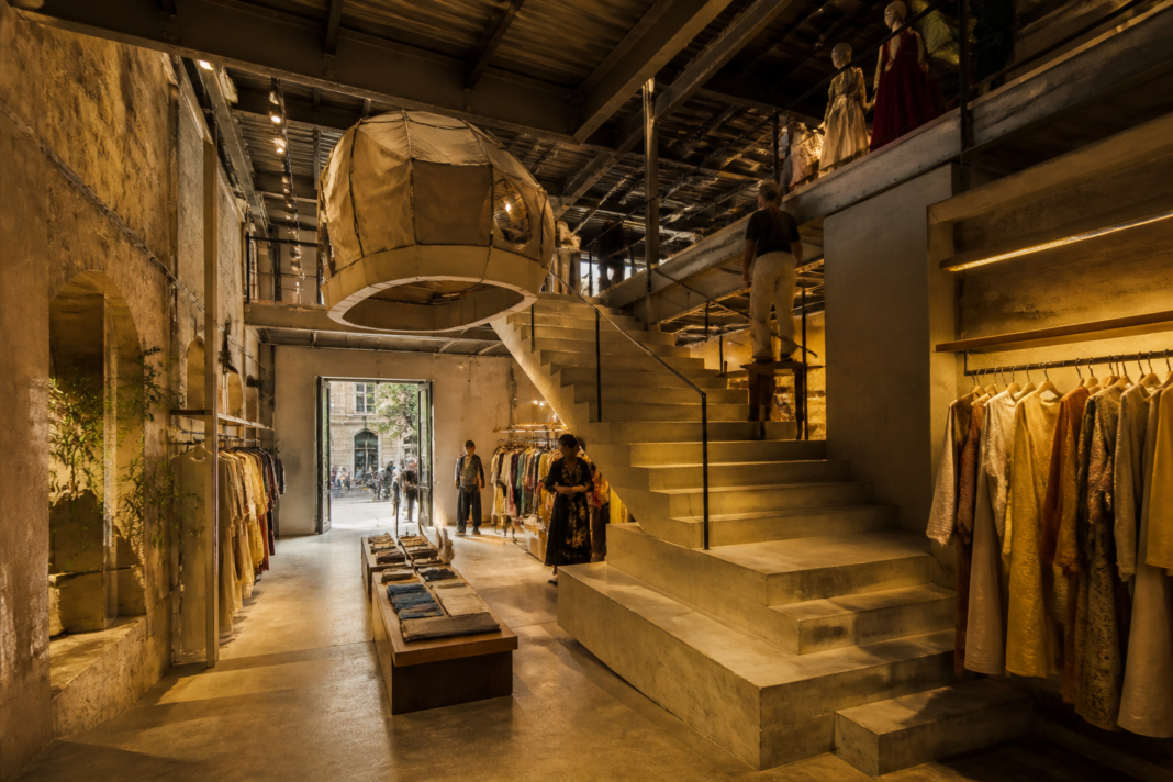 Indian designer fashion flagship store interior in Mumbai with sculptural forms and heritage architecture