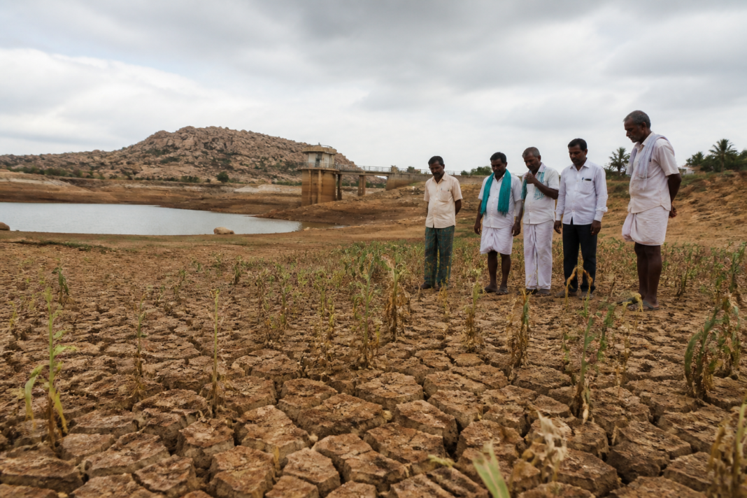 Karnataka drought conditions affecting a dry agricultural landscape and depleted water reservoir
