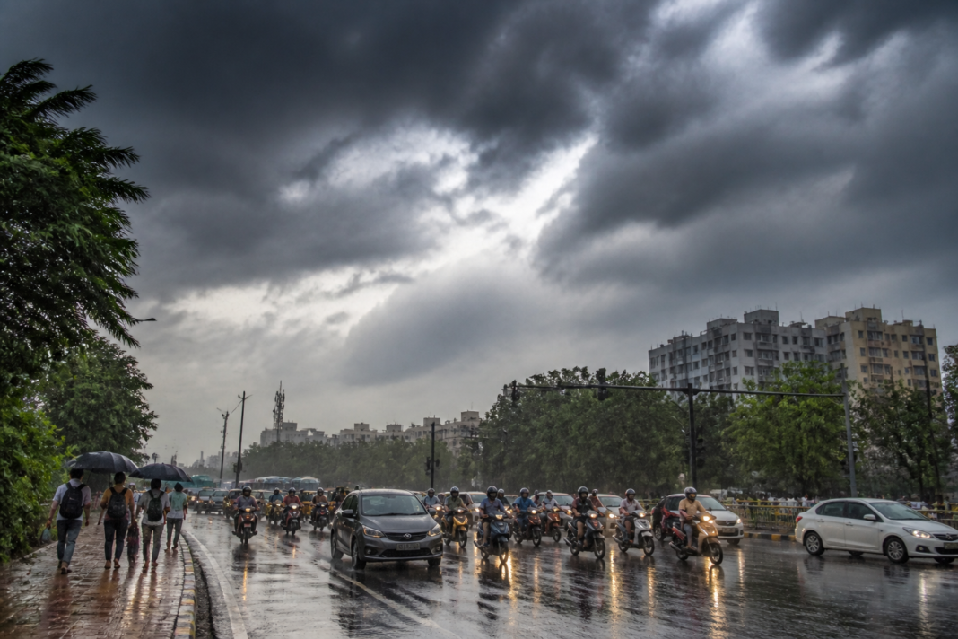 Tamil Nadu heat easing as rain clouds gather over a Chennai street