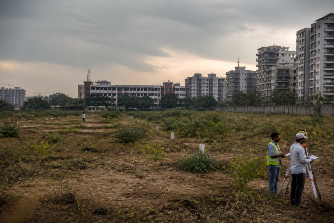 Pune land deal under investigation near Mundhwa, with urban development and protected land in view.