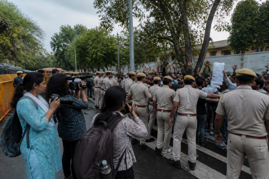 Delhi Police personnel managing a protest near Jantar Mantar amid complaints from women journalists