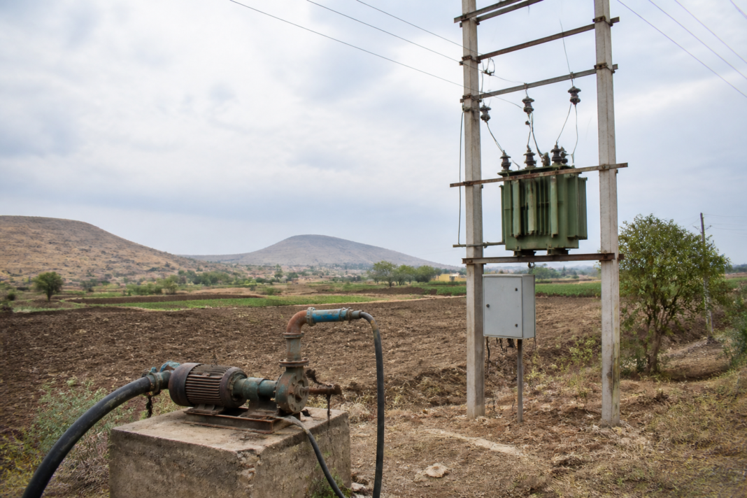 Nashik agricultural pumps connected to a rural power transformer and electricity lines