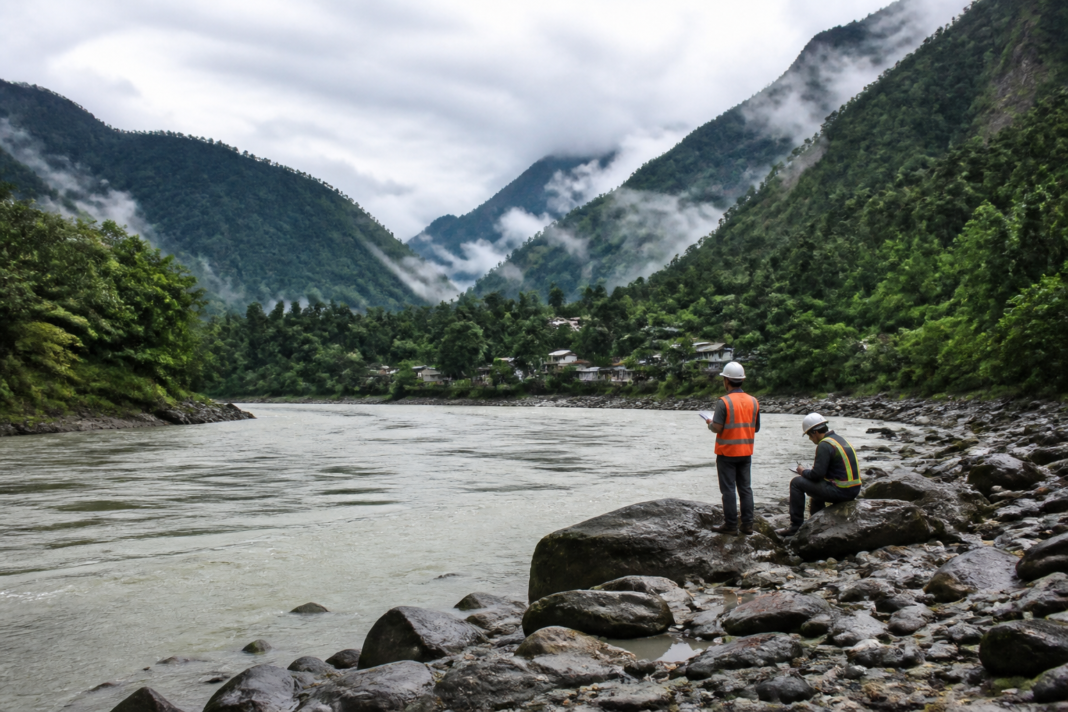 Siang project landscape in Arunachal Pradesh with river valley, forested hills and hydropower survey activity