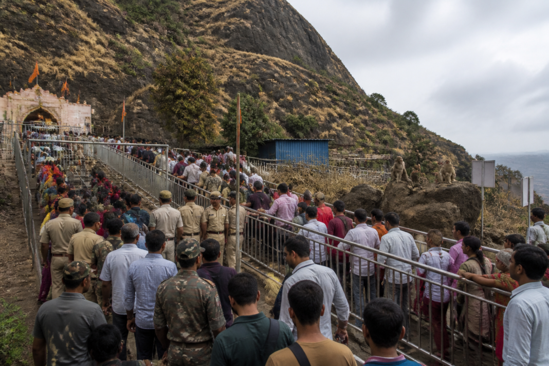 Saptashrungi Gad safety signage warning devotees about monkeys during Navratra