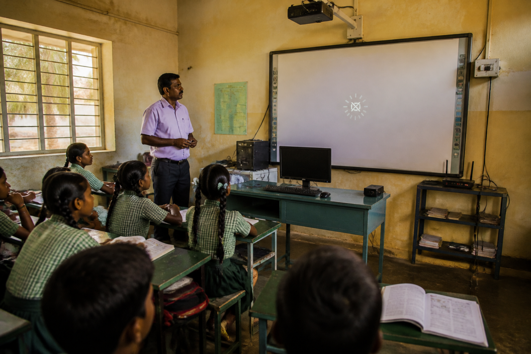 Tamil Nadu government school classroom with smart board and limited internet connectivity