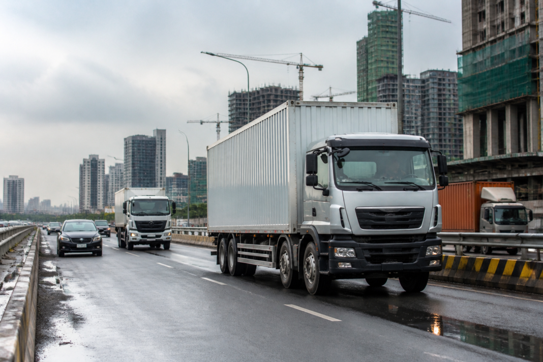 Tata Motors Iveco offer represented by a commercial truck on an urban freight road