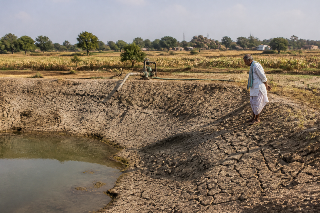 Telangana drought conditions affecting a low-storage irrigation tank and surrounding farmland