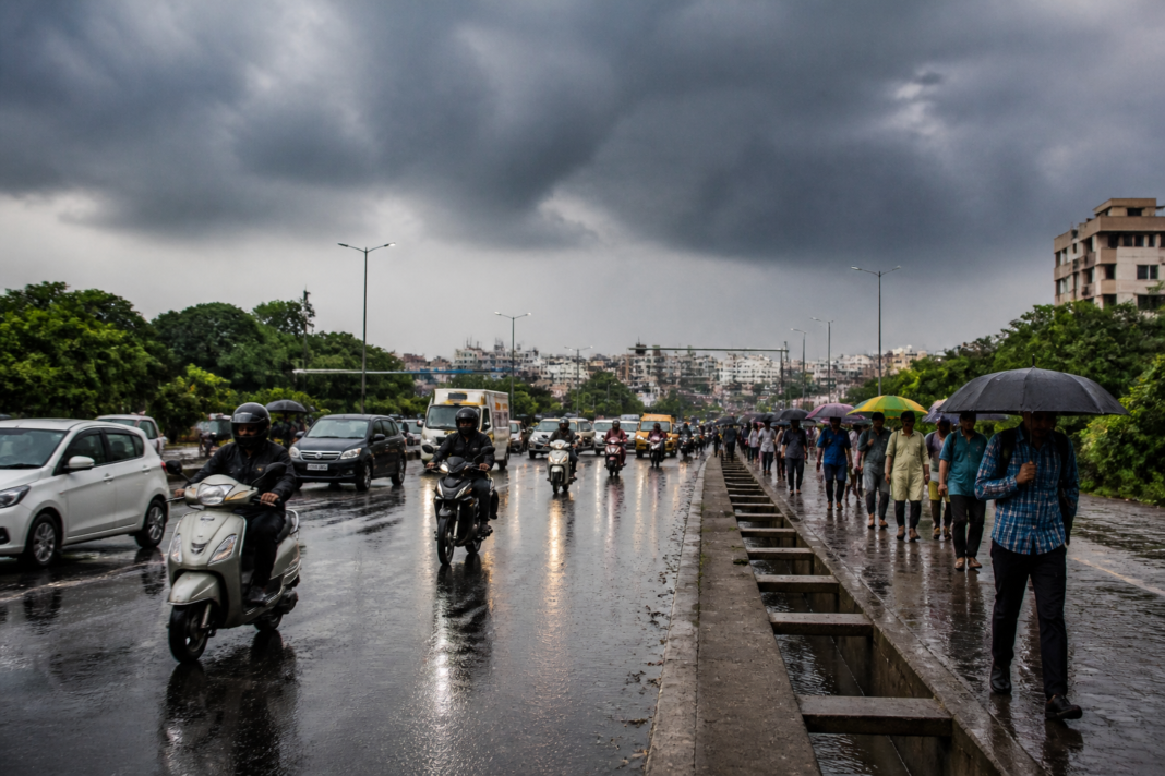 Northeast monsoon clouds gathering over a Tamil Nadu city street