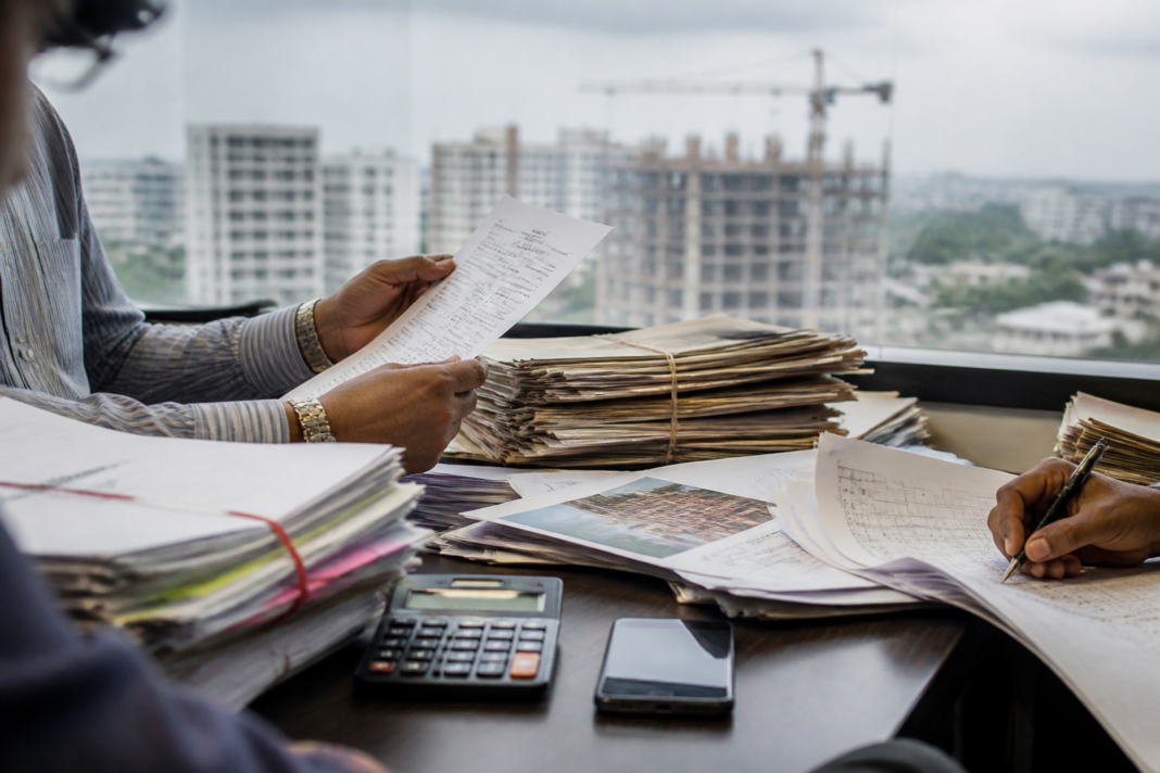 Karnataka Ponzi scheme investigation involving property documents and financial records