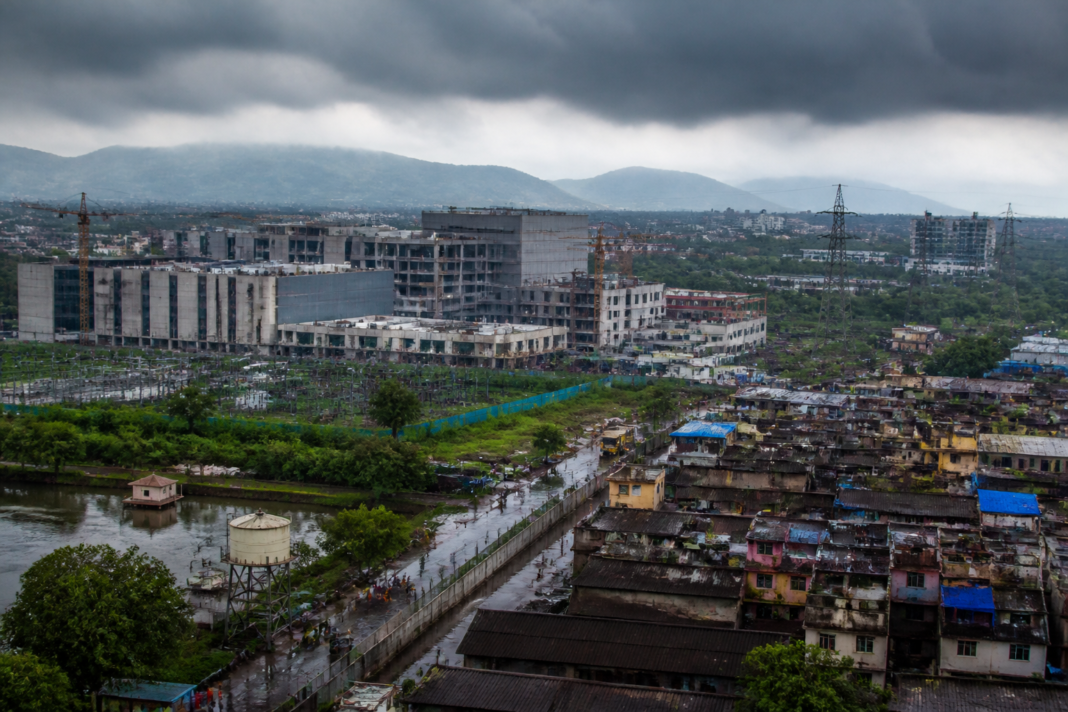 Maharashtra data centres rising near a dense Mumbai-region neighbourhood and utility infrastructure